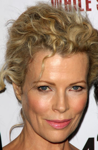 Actress Kim Basinger arrives at the premiere Of Anchor Bay Entertainment's "While She Was Out" on December9, 2008 at the Archlight Hollywood in Los Angeles, California.